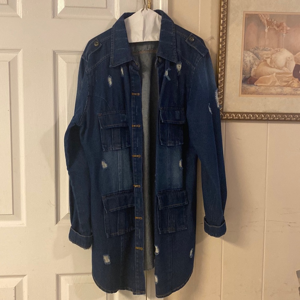 Distressed denim jacket. Size extra-large.